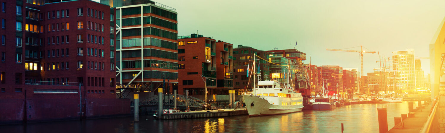 Beautiful Picture of Sunset in Port City with Water, Ships and B Hamburg, Germay